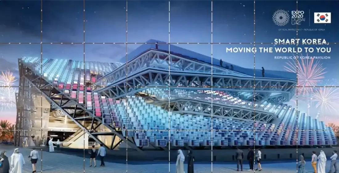Expo 2020 Korea Pavilion microsite: the pavilion lit at night under the line Smart Korea, moving the world to you